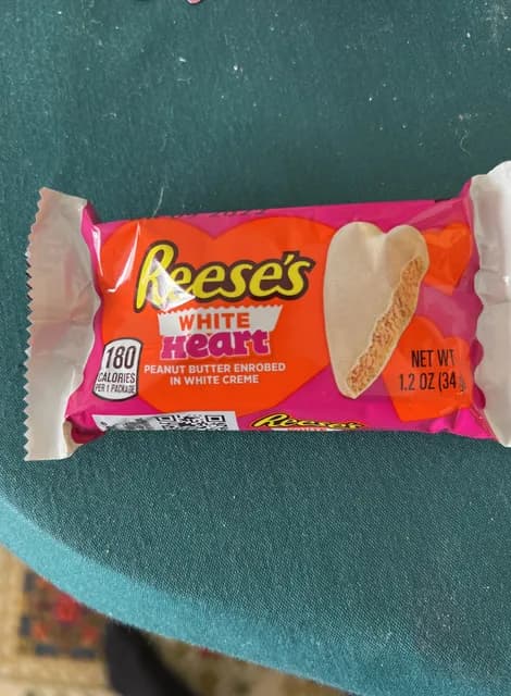 Reese'S White Heart Peanut Butter Enrobed In White Creme