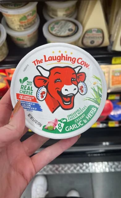 The Laughing Cow Creamy Garlic & Herb Spreadable Cheese Wedges