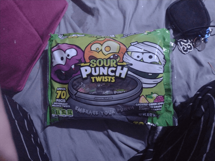 Sour Punch Twists Ghostly Green Apple, Ghoulish Grape And Oozing Orange Flavored Candy