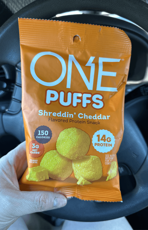 One Puffs Shreddin' Cheddar Flavored Protein Snack